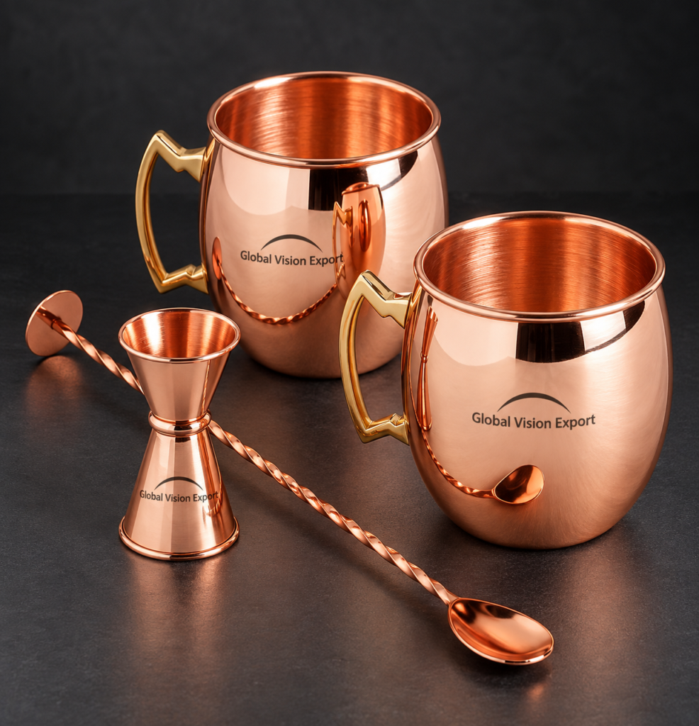 Copper barware set with mugs, jigger and bar spoon by Global Vision Export