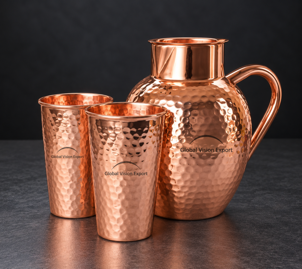 Hammered copper water jug with two matching tumblers by Global Vision Export